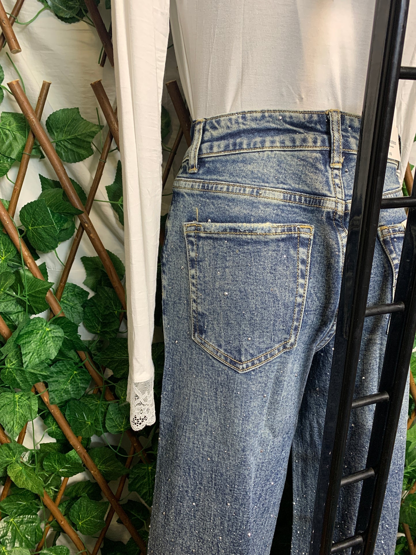 Shiny jeans with crease