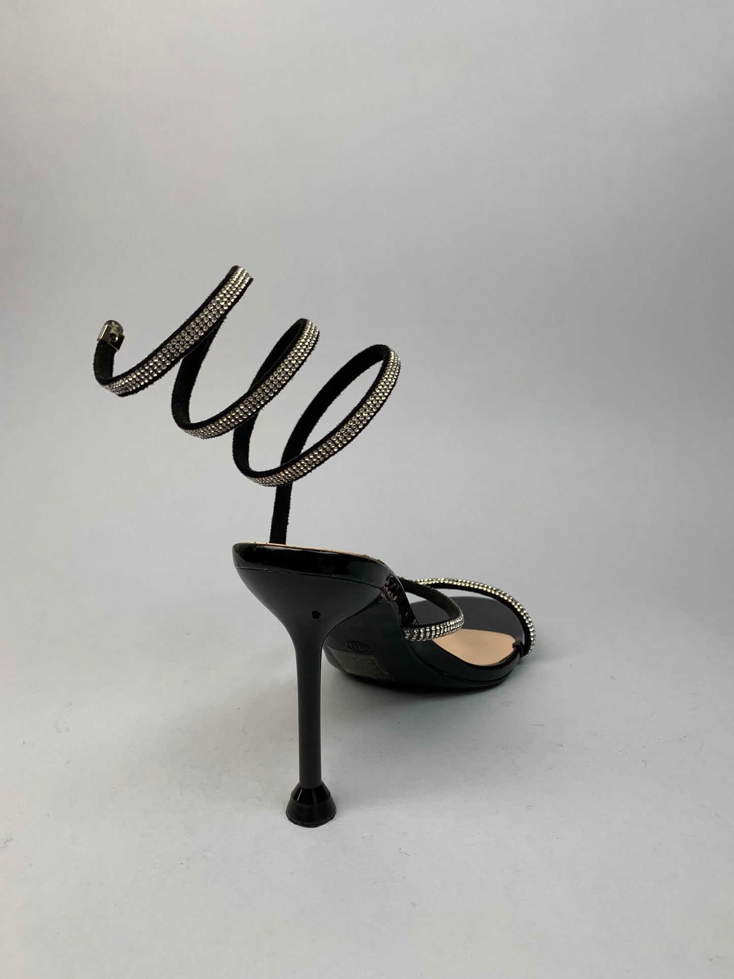 Black gladiator sandals with spiral heel and rhinestones