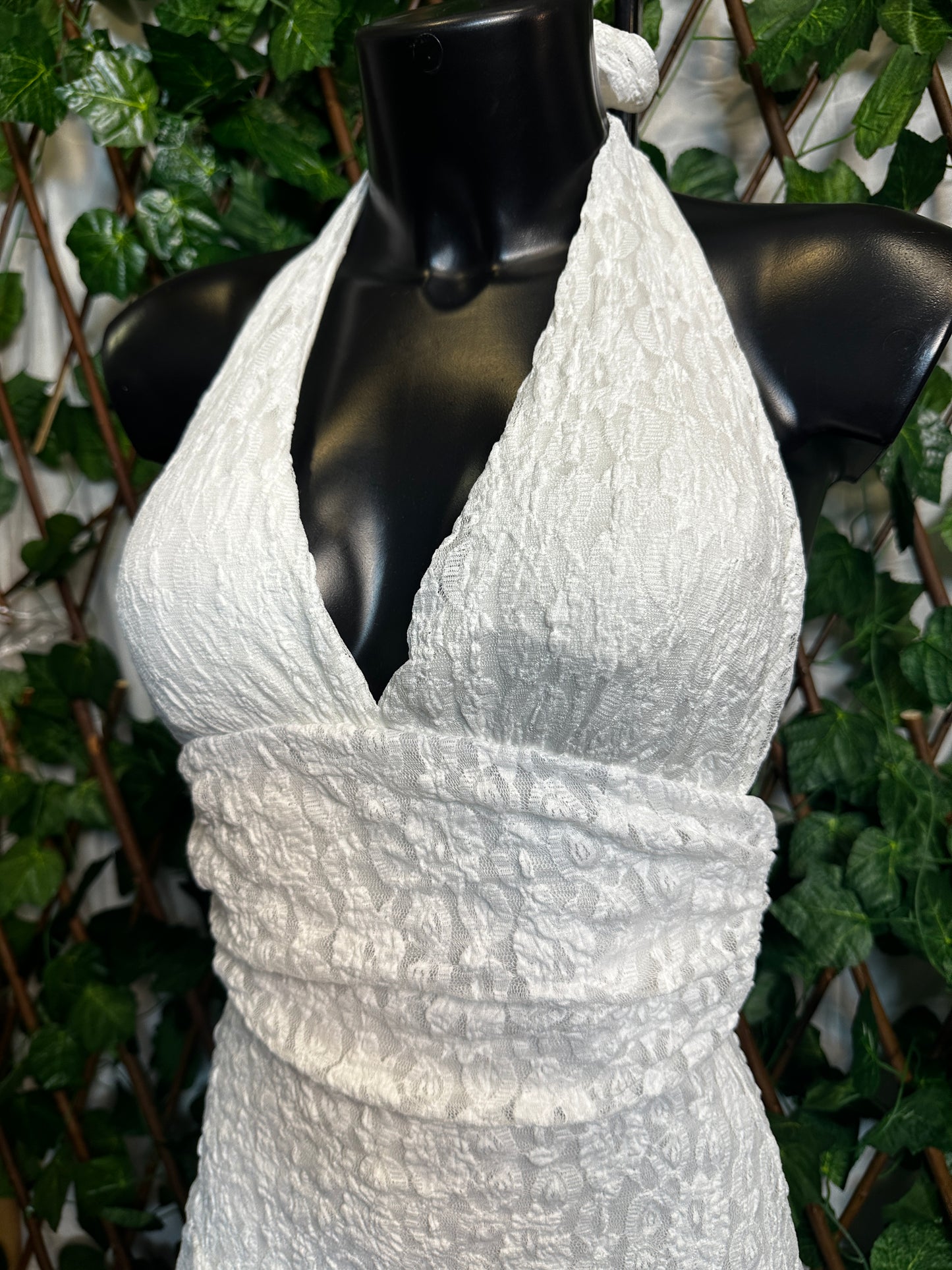 Crepe style: deep neckline with cups and open back, with shorts tucked in | one size