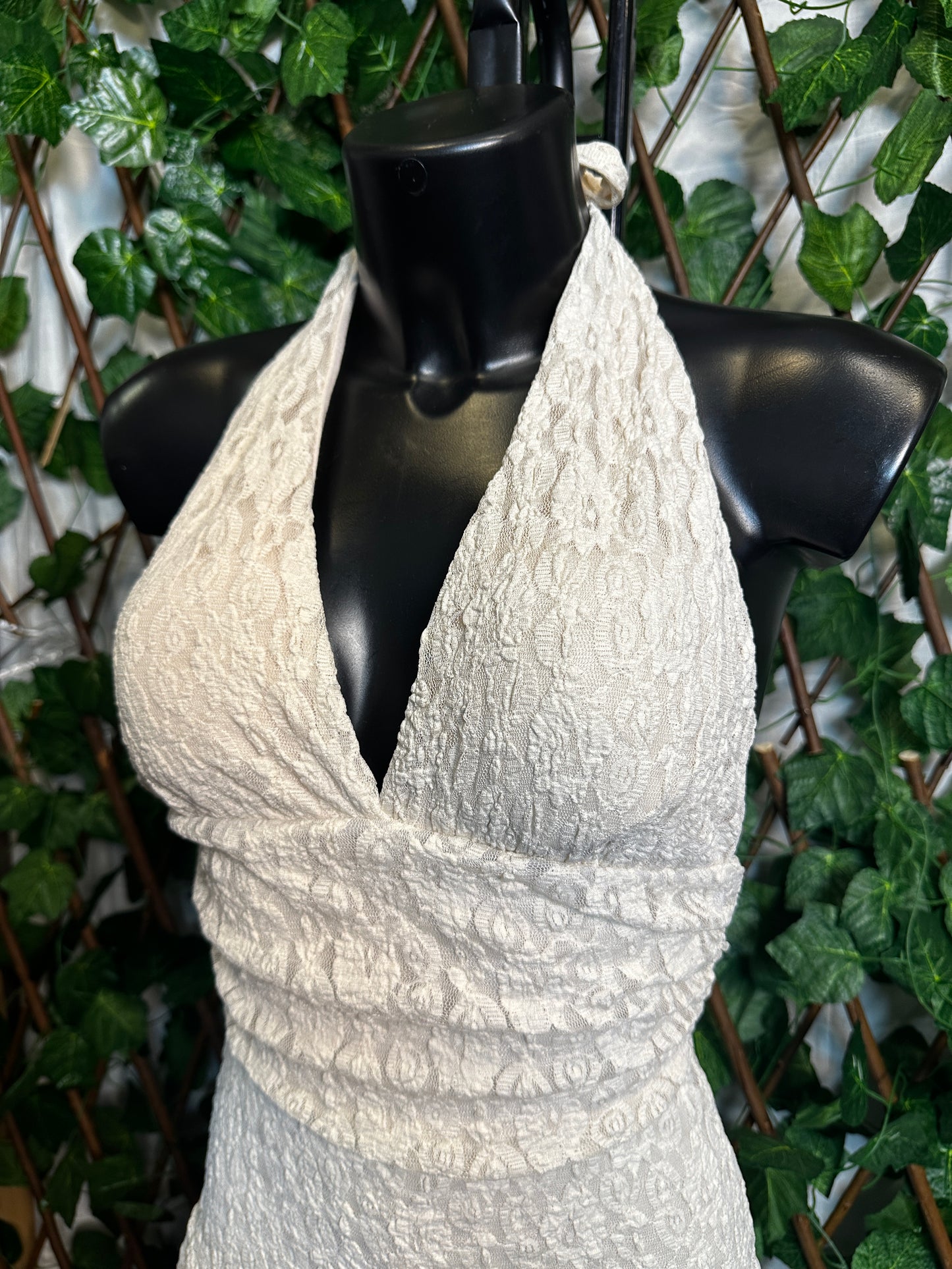 Crepe style: deep neckline with cups and open back, with shorts tucked in | one size