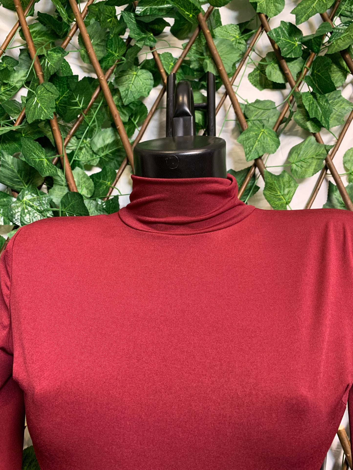 Short dress with high neck and open back