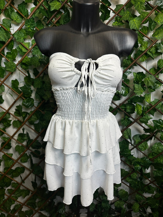 Vestito corto senza spalline, sotto svasato, con brillantini