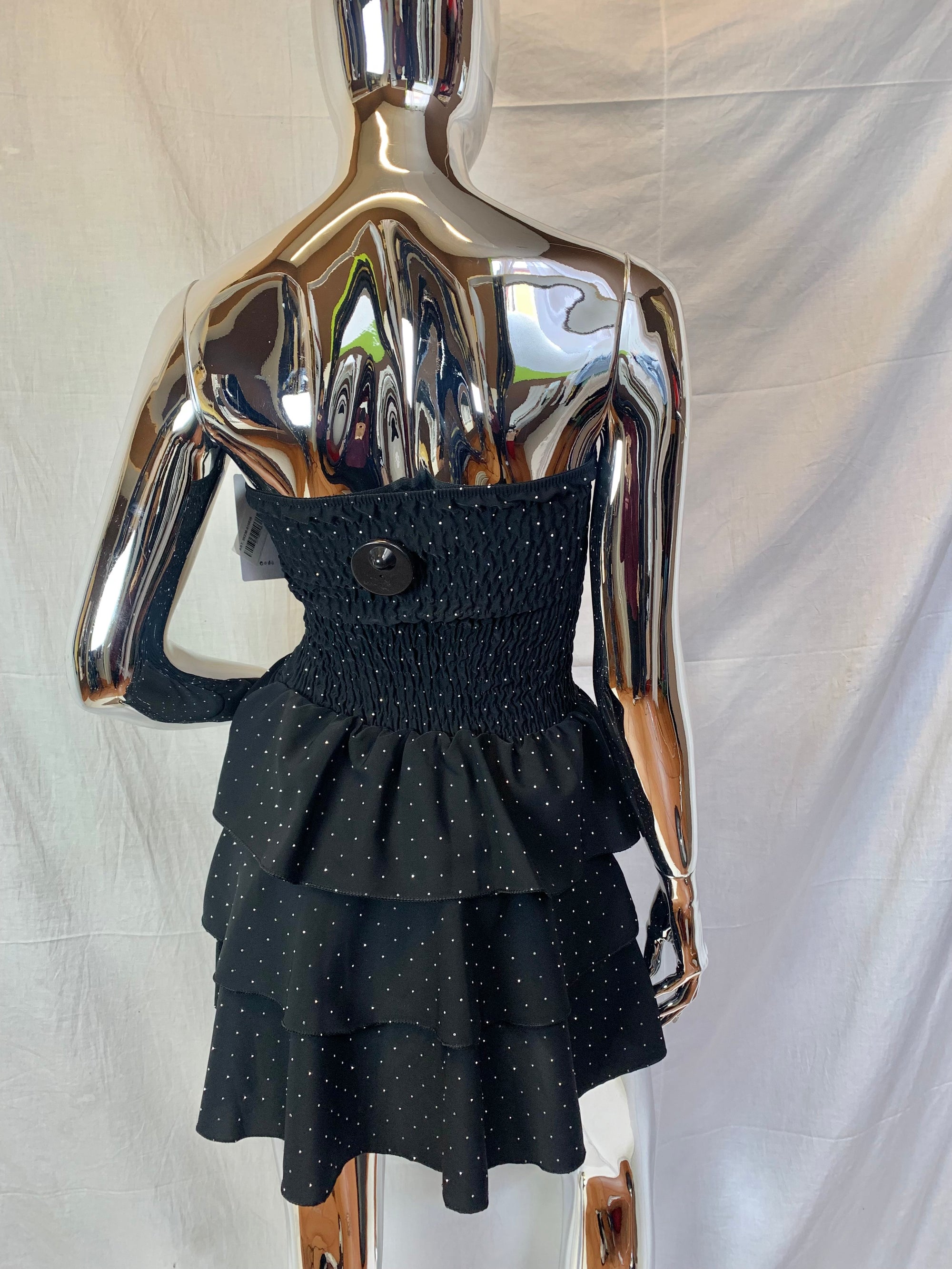 Vestito corto senza spalline, sotto svasato, con brillantini