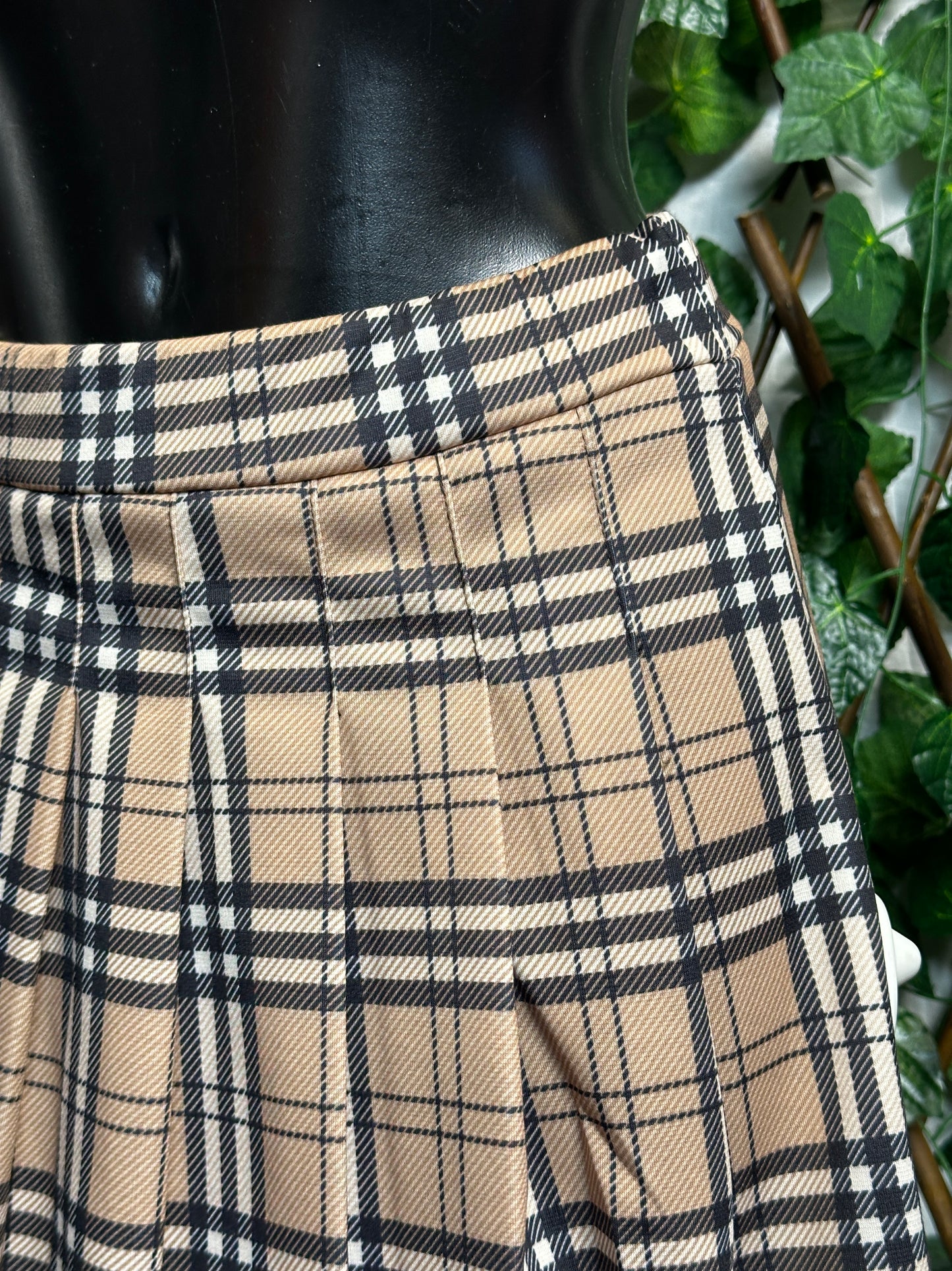 Short checked skirt with integrated shorts