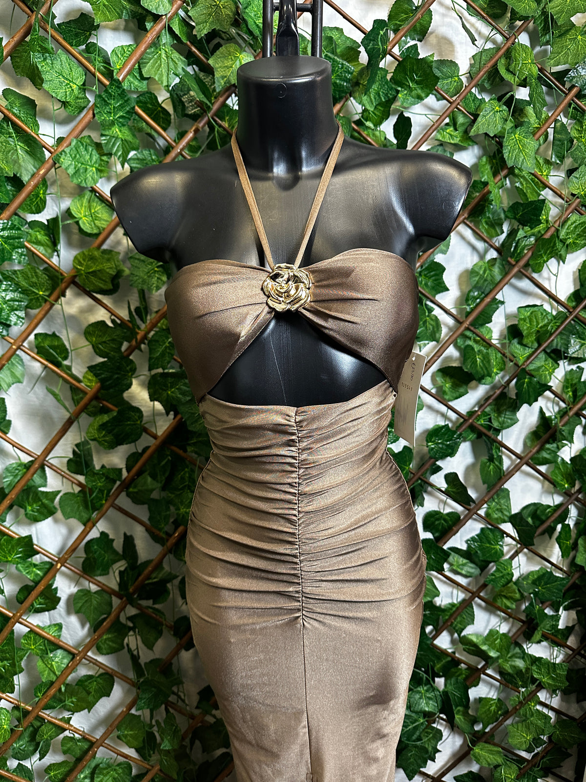 Long dress with golden flower detail and ruching on the front
