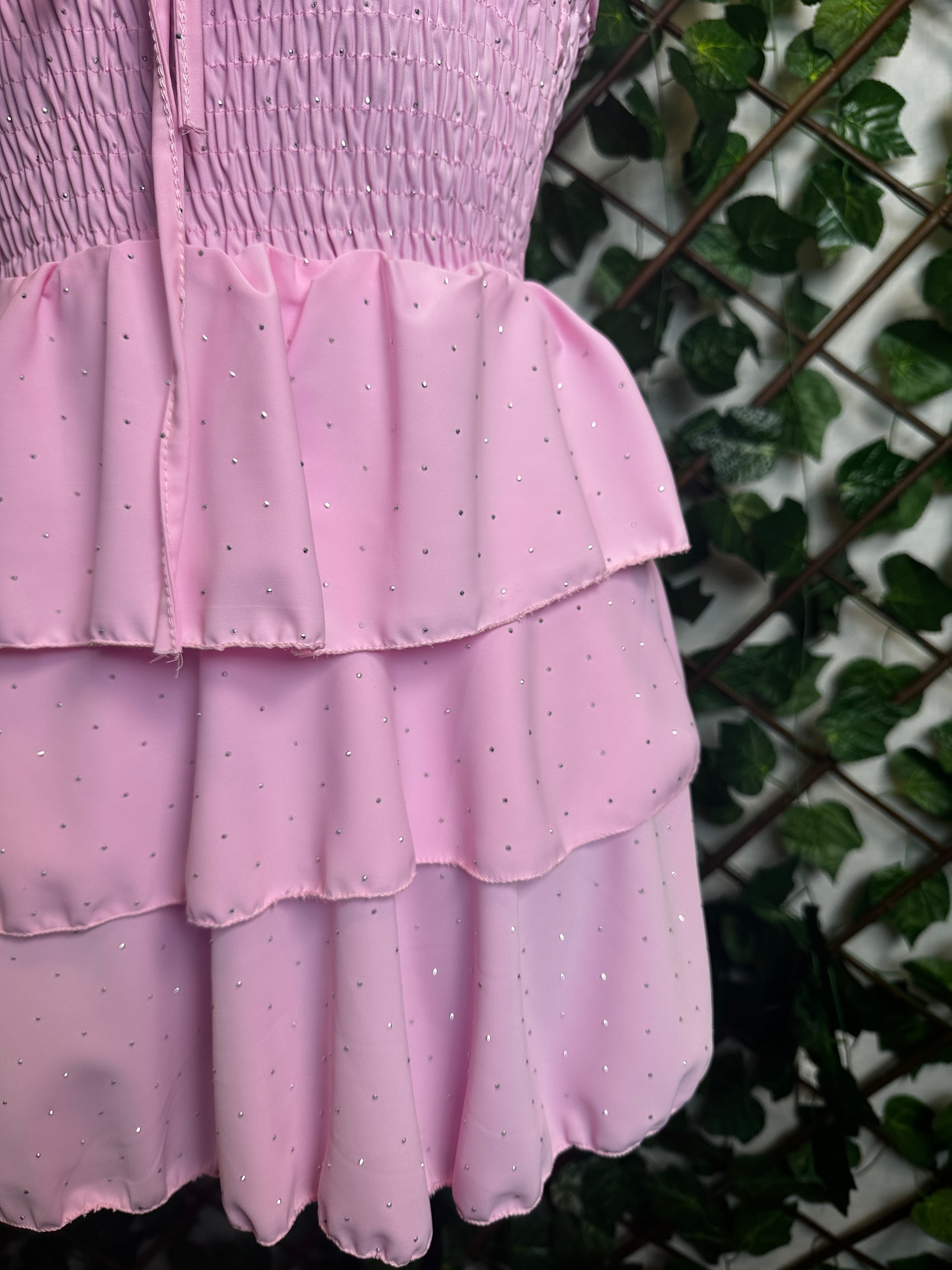 Vestito corto senza spalline, sotto svasato, con brillantini
