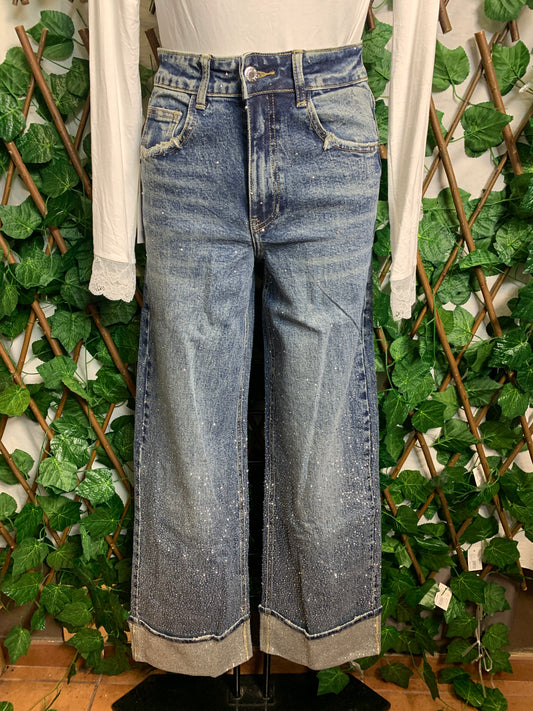 Jeans brillanti con piega