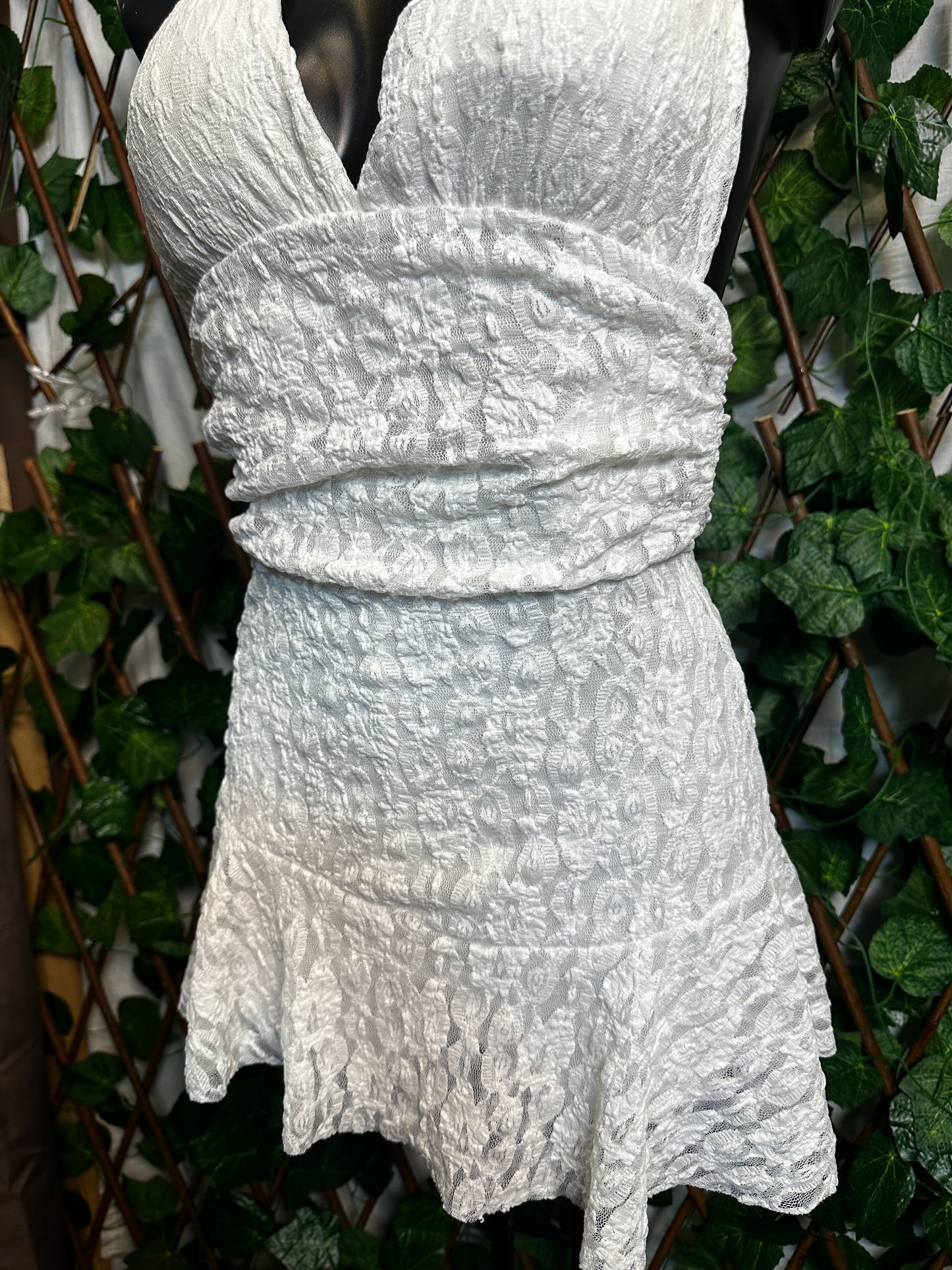 Crepe style: deep neckline with cups and open back, with shorts tucked in | one size