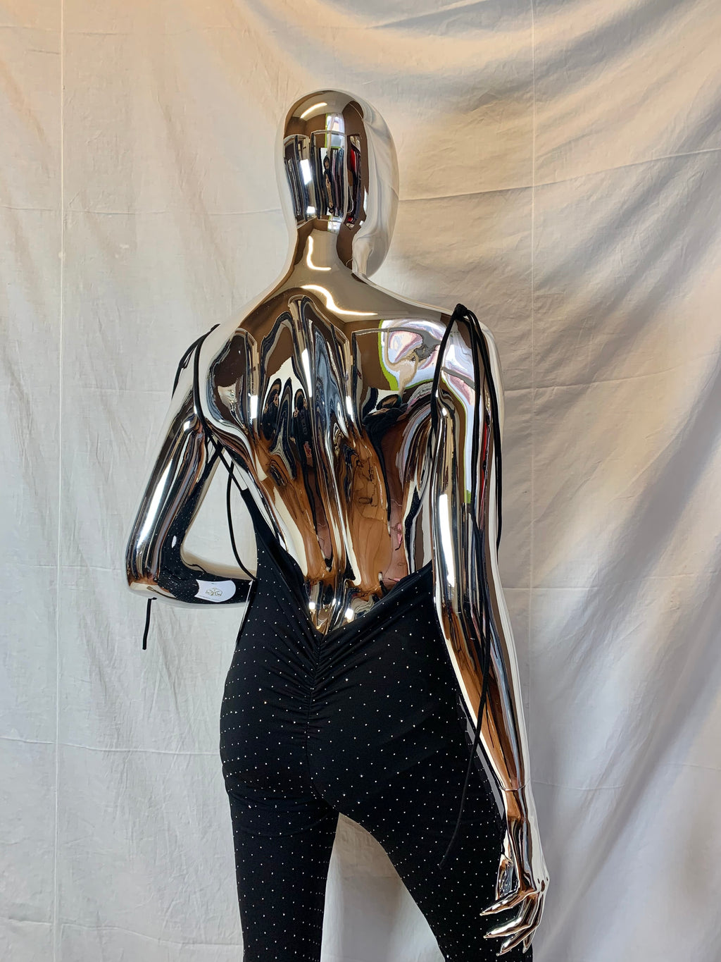 Flared One-Piece Jumpsuit with Glitter TU