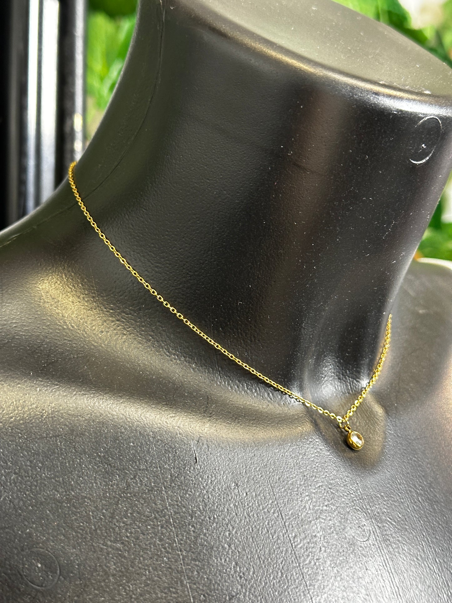 Chain necklace with rhinestones on the back