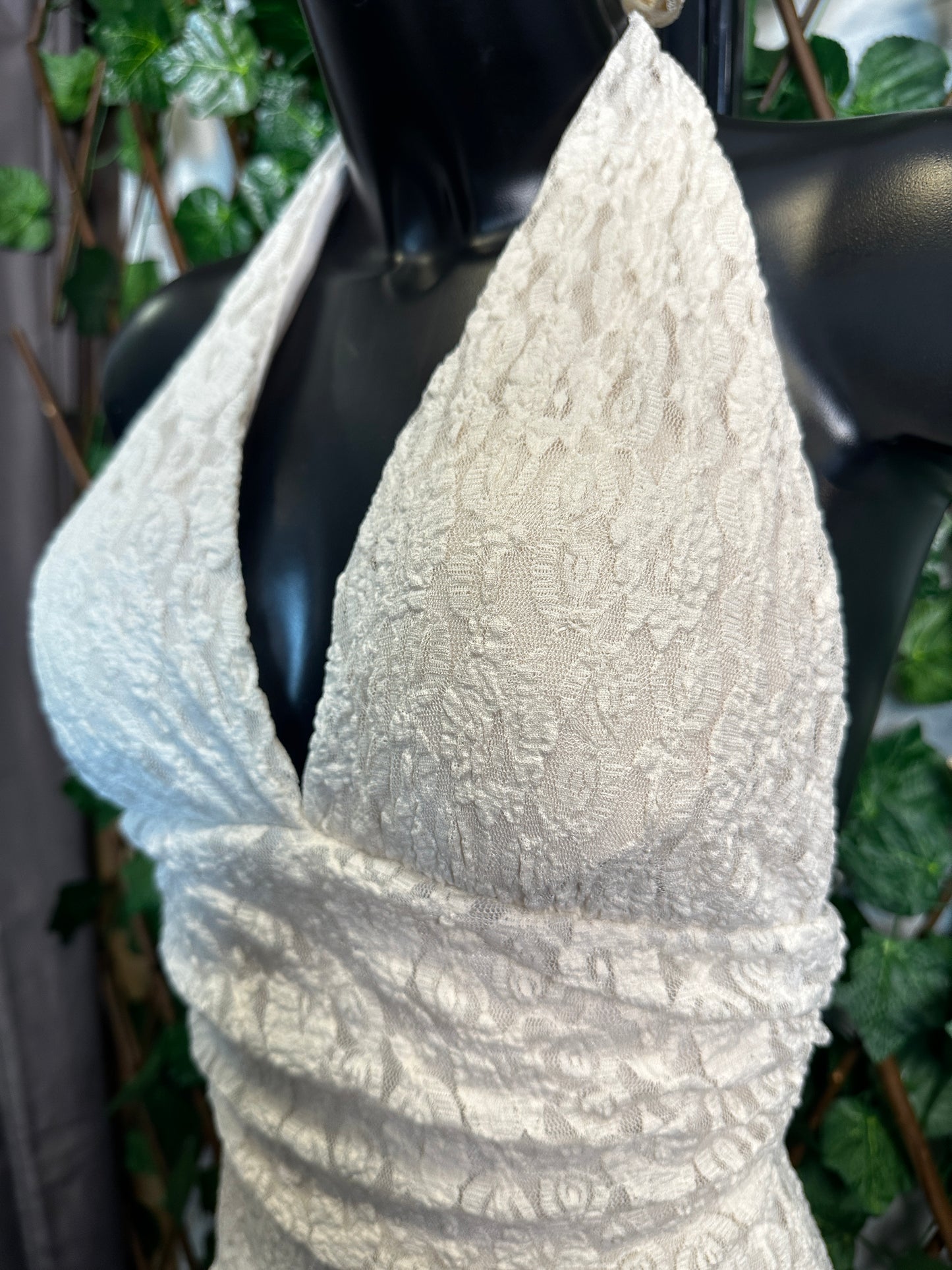 Crepe style: deep neckline with cups and open back, with shorts tucked in | one size