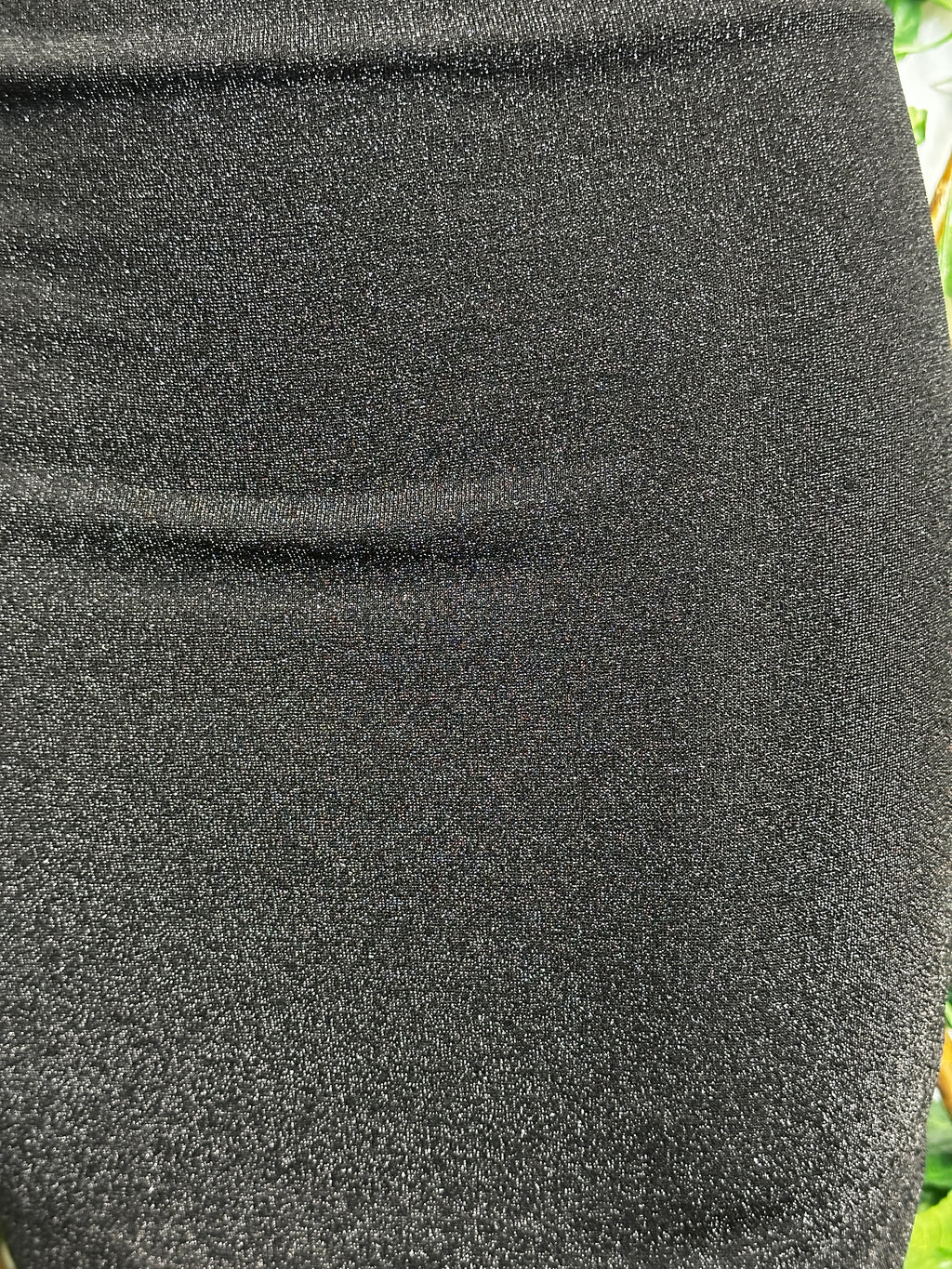 Vestito brillantinato con la scollatura profonda e schiena scoperta