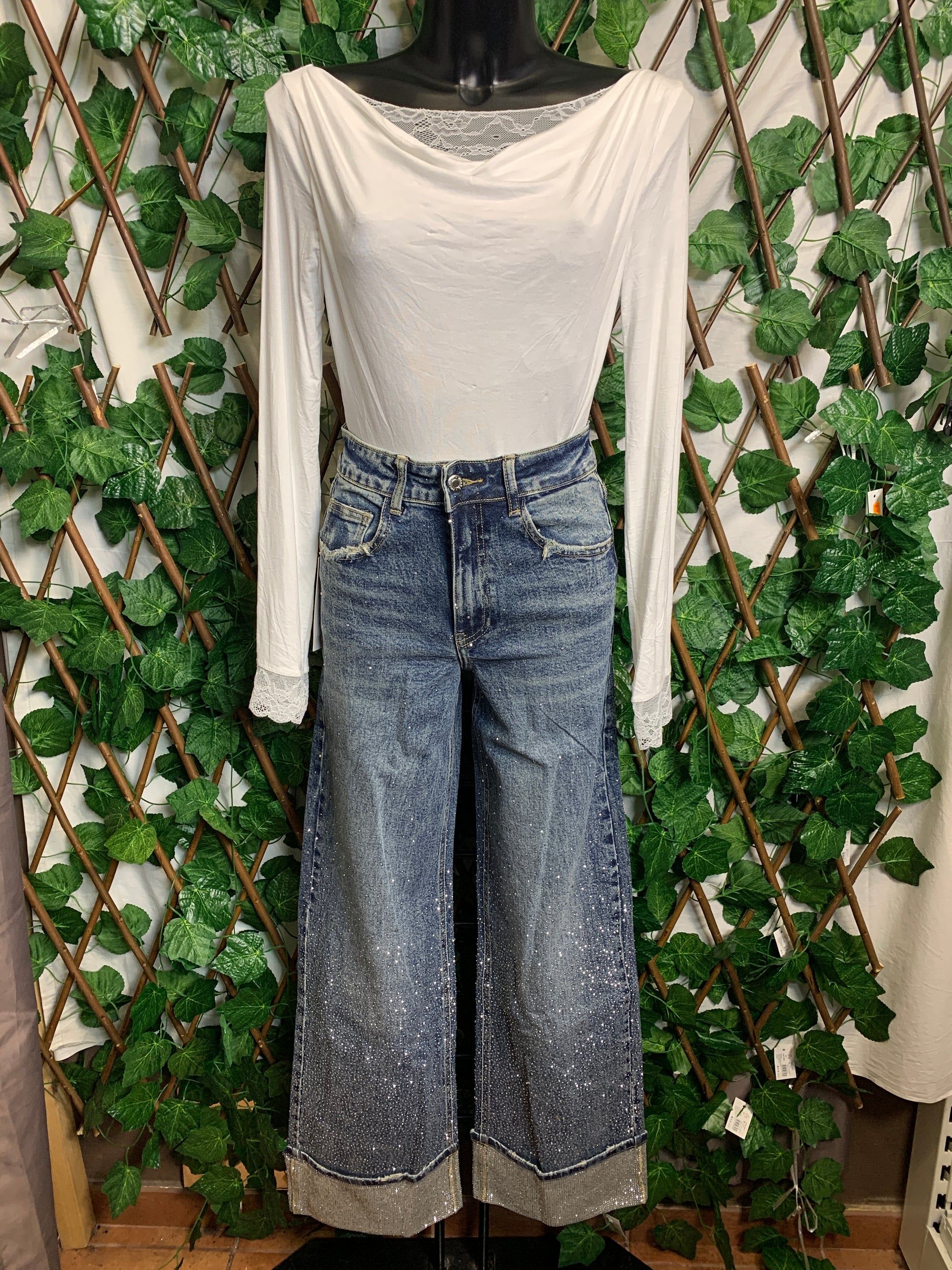 Jeans brillanti con piega
