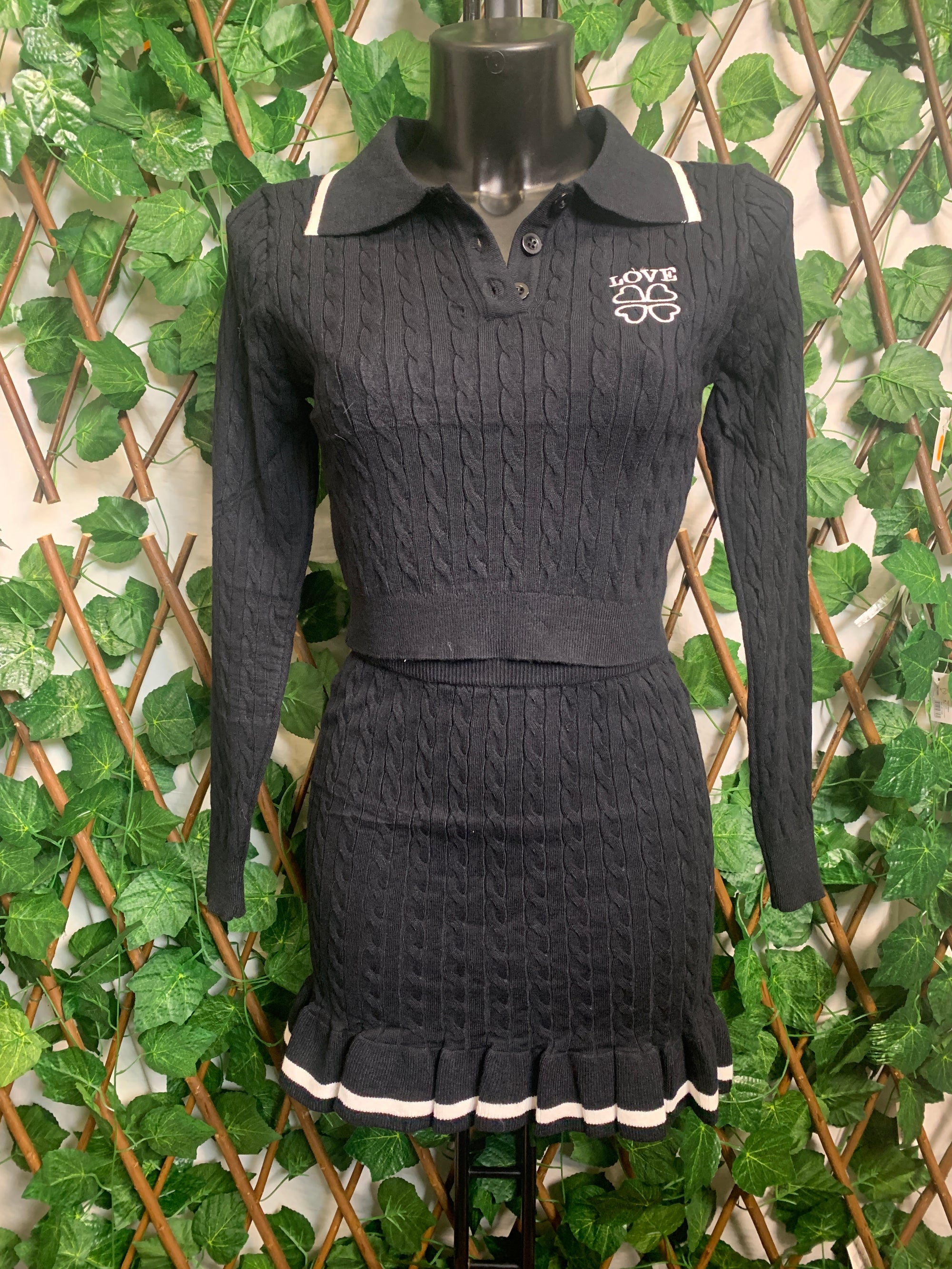 Long-sleeved suit and short skirt