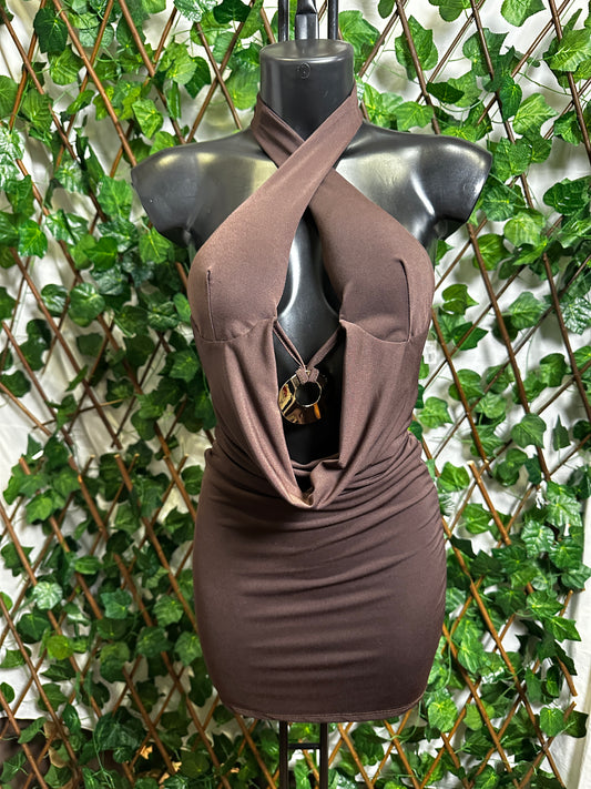 Short dress with a deep neckline, gold circle detail, and an open back | one size