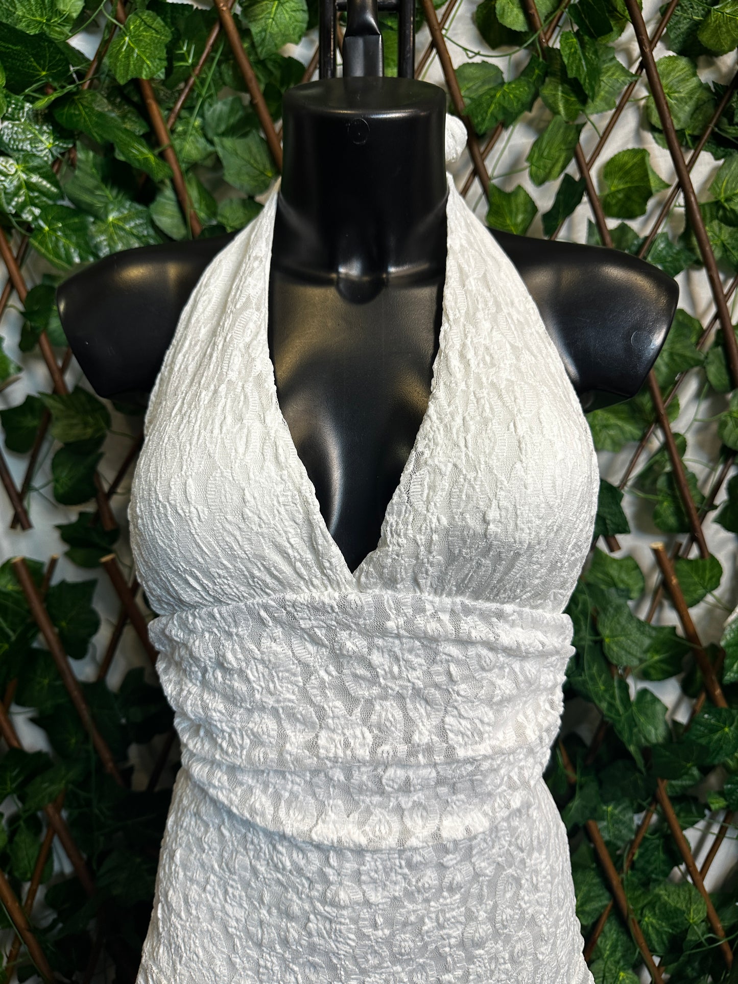 Crepe style: deep neckline with cups and open back, with shorts tucked in | one size