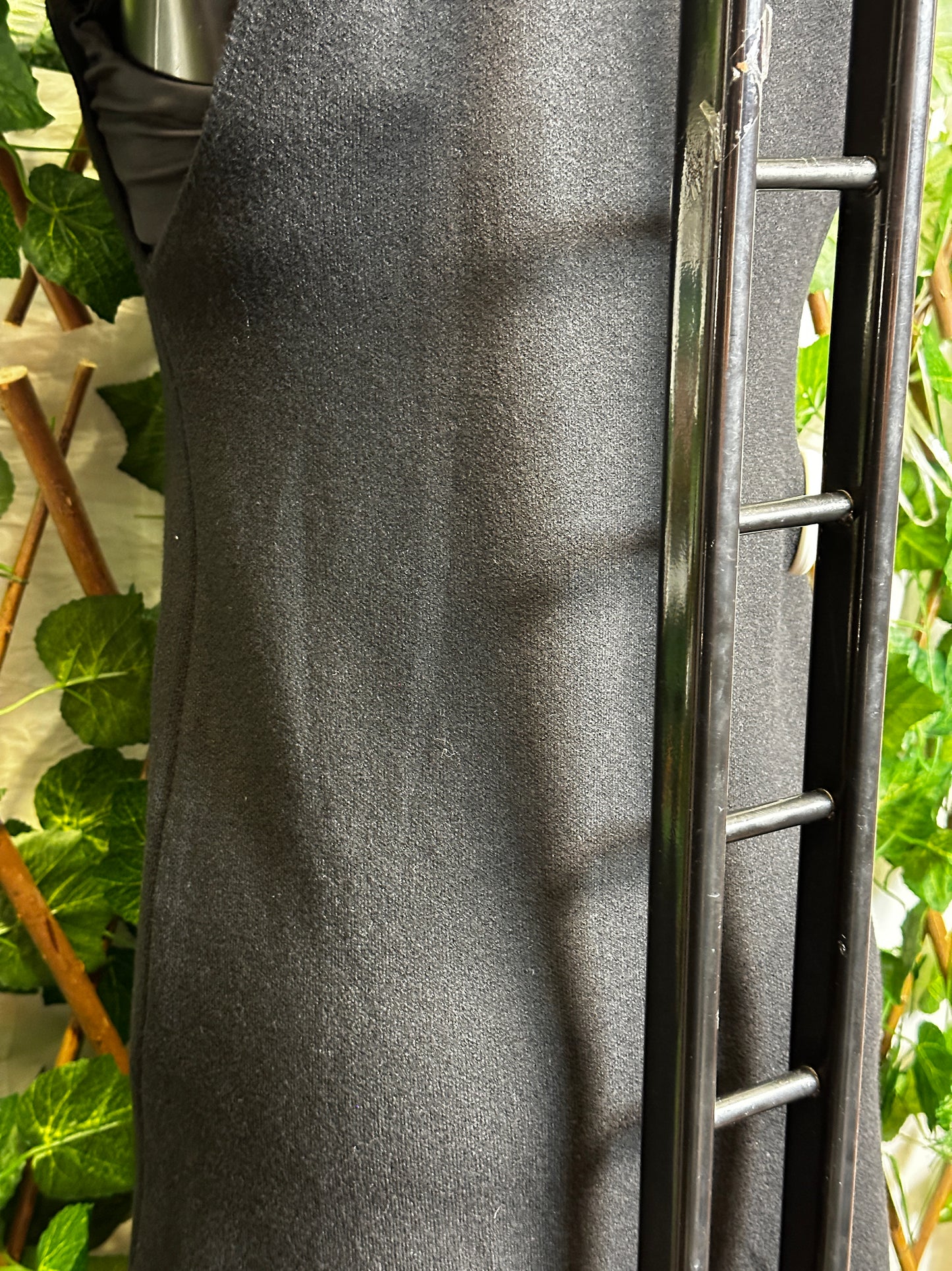 Maglione lungo senza maniche con collo brillantinato