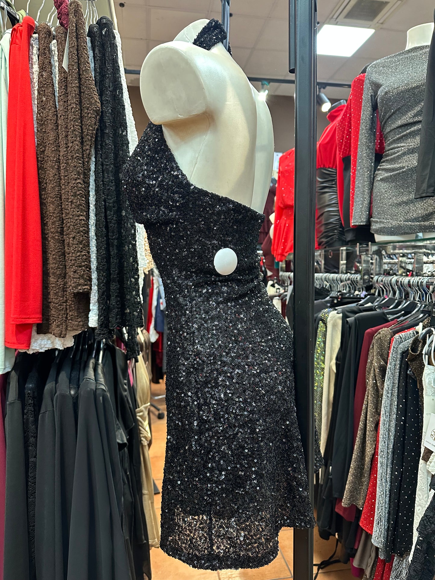 Mini-abito paillettes schiena nuda e scollo profondo – SEDUZIONE COSMICA