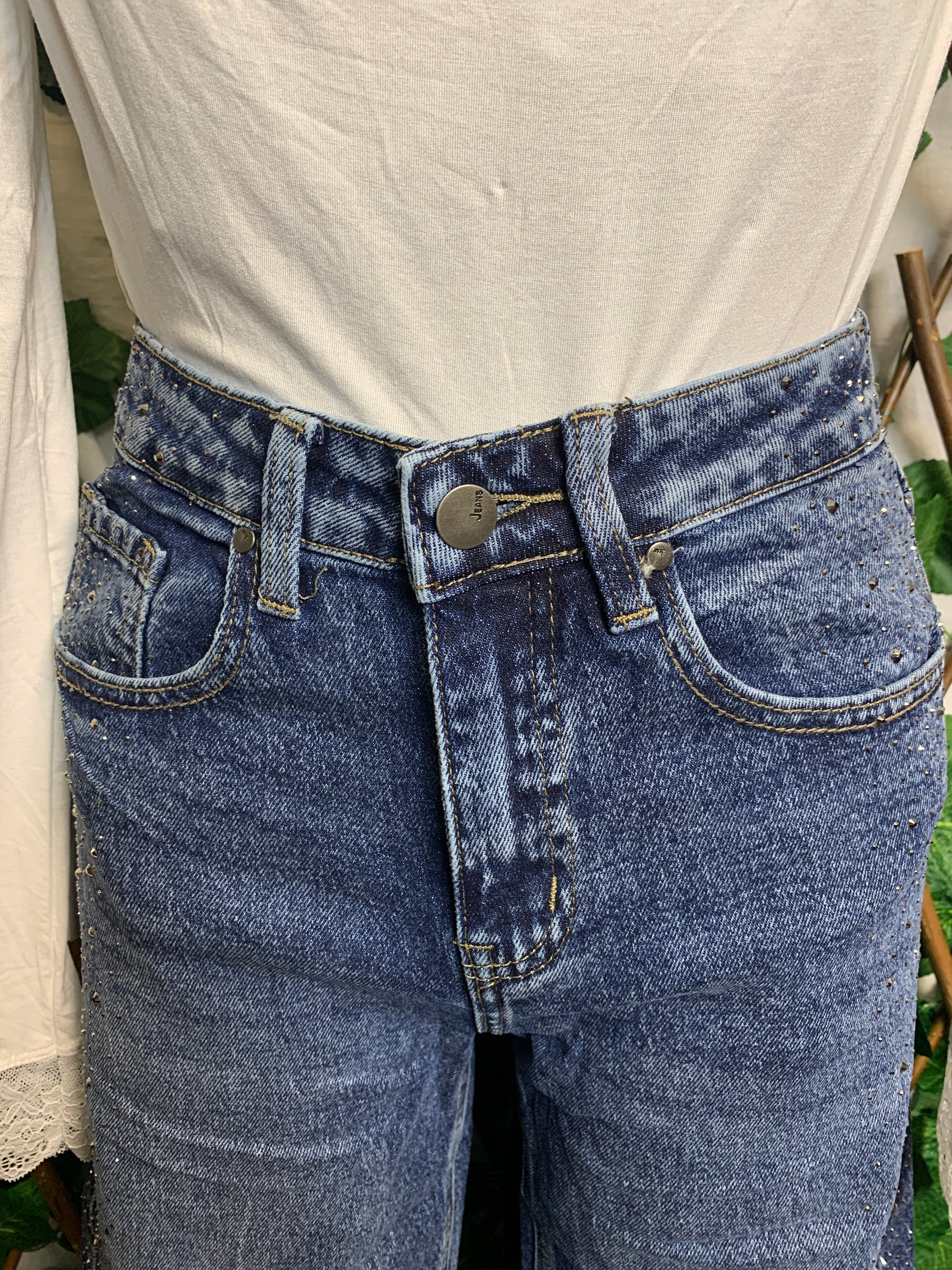 Jeans con brillantini sui fianchi