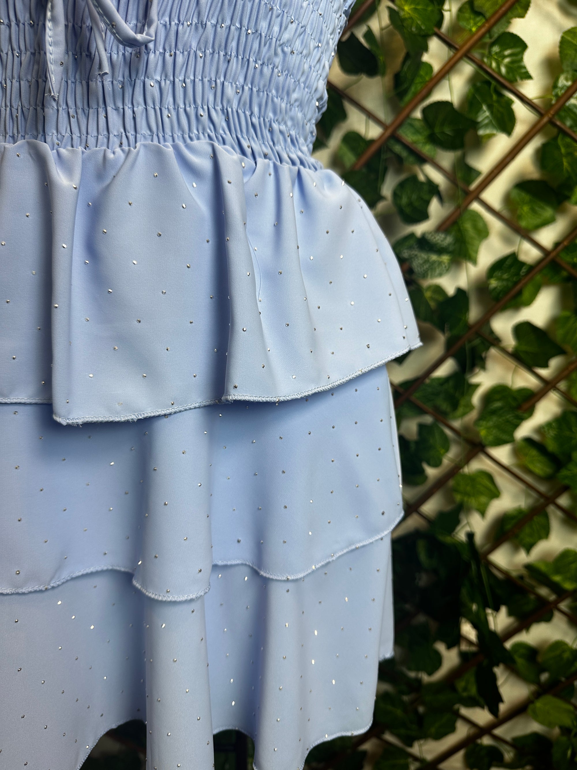 Vestito corto senza spalline, sotto svasato, con brillantini