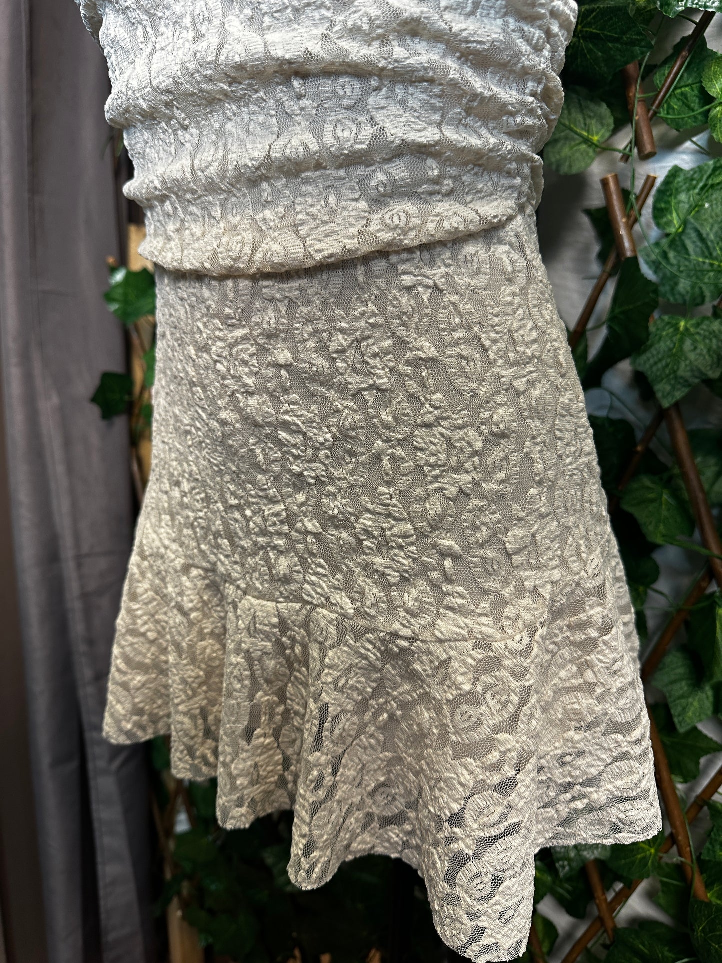 Crepe style: deep neckline with cups and open back, with shorts tucked in | one size