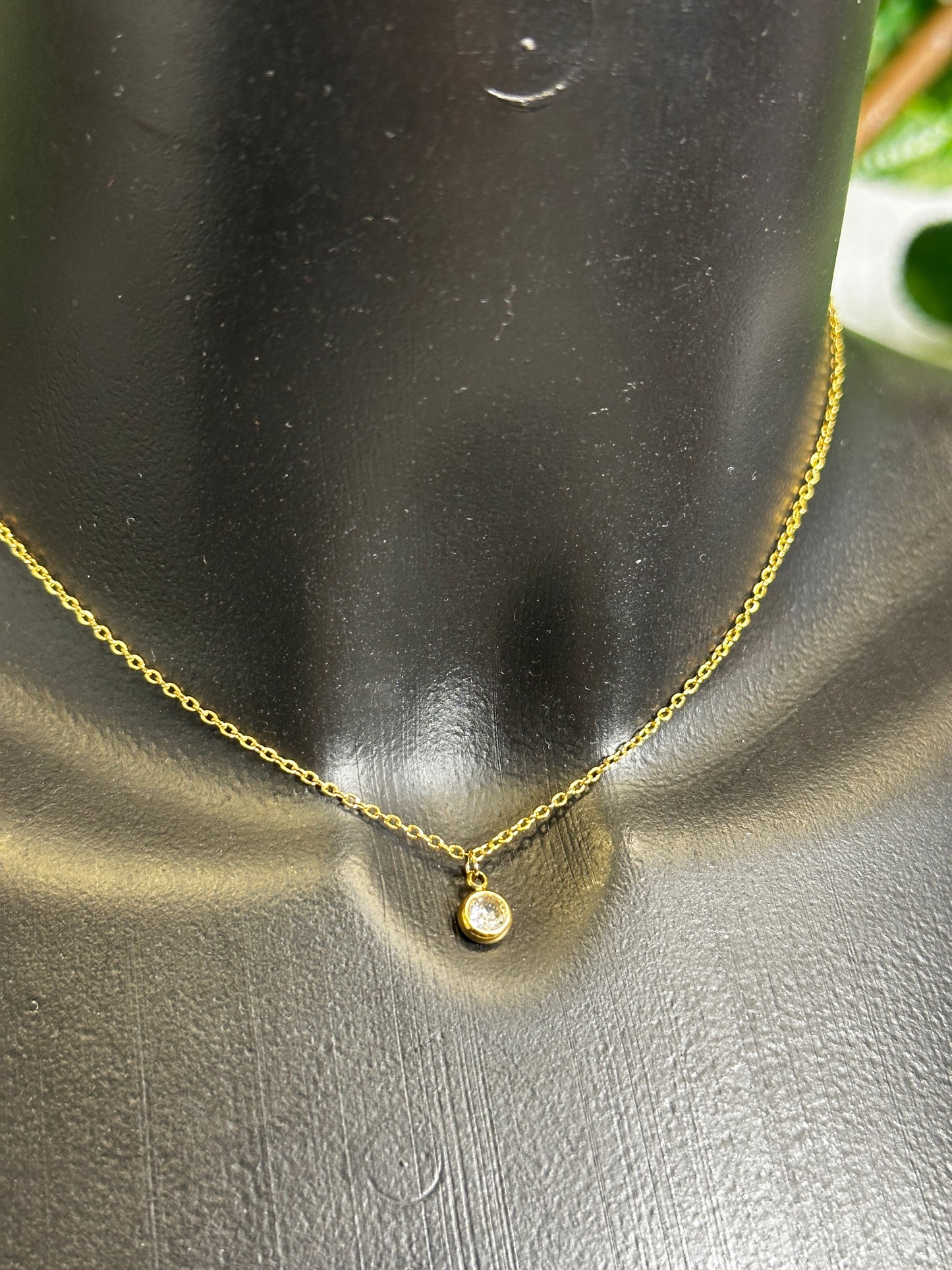 Chain necklace with rhinestones on the back