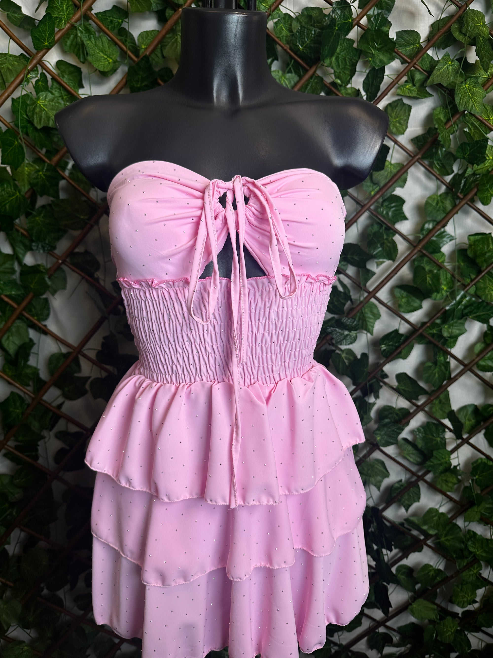 Vestito corto senza spalline, sotto svasato, con brillantini