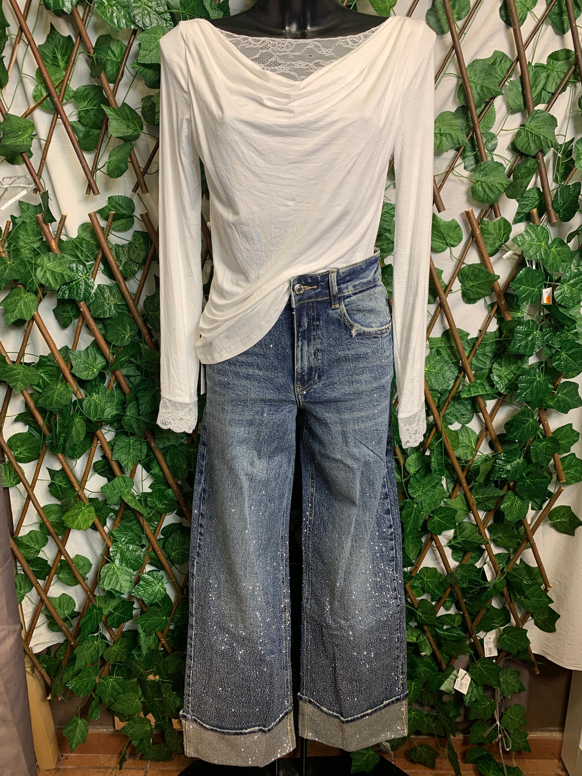 Jeans brillanti con piega