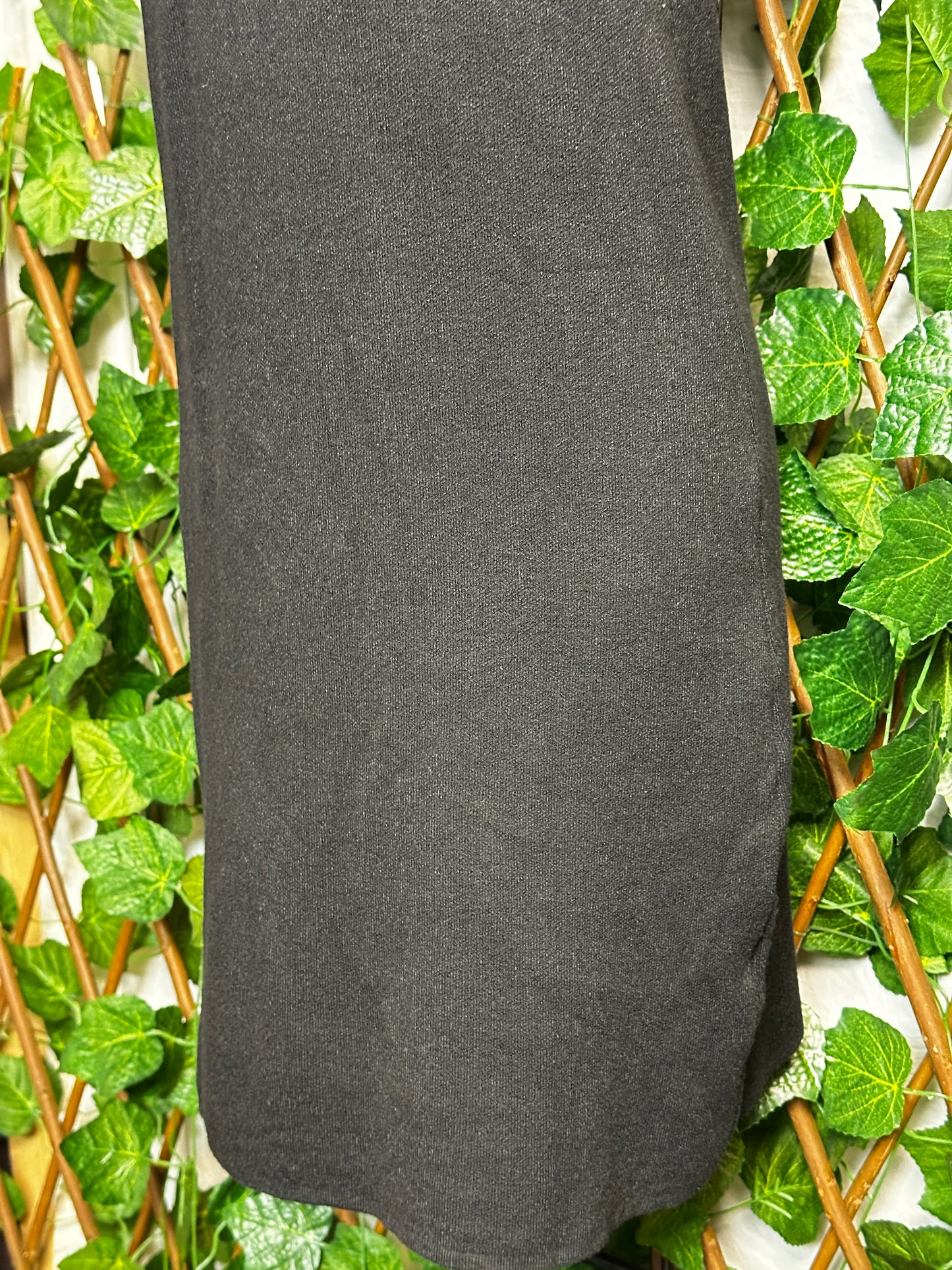 Maglione lungo senza maniche con collo brillantinato