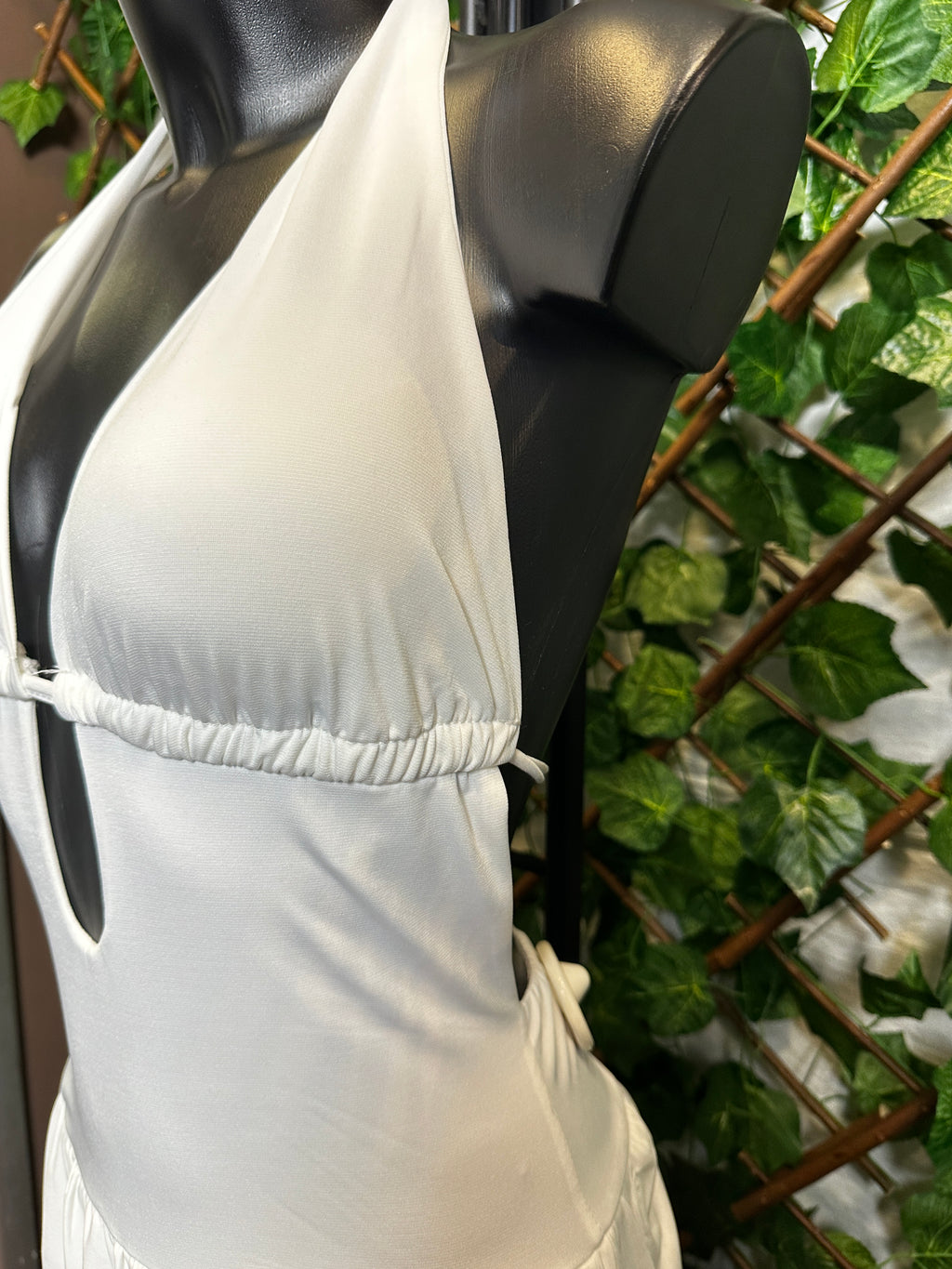 Vestito corto con la scolatura profonda e la schiena scoperta | taglia unica