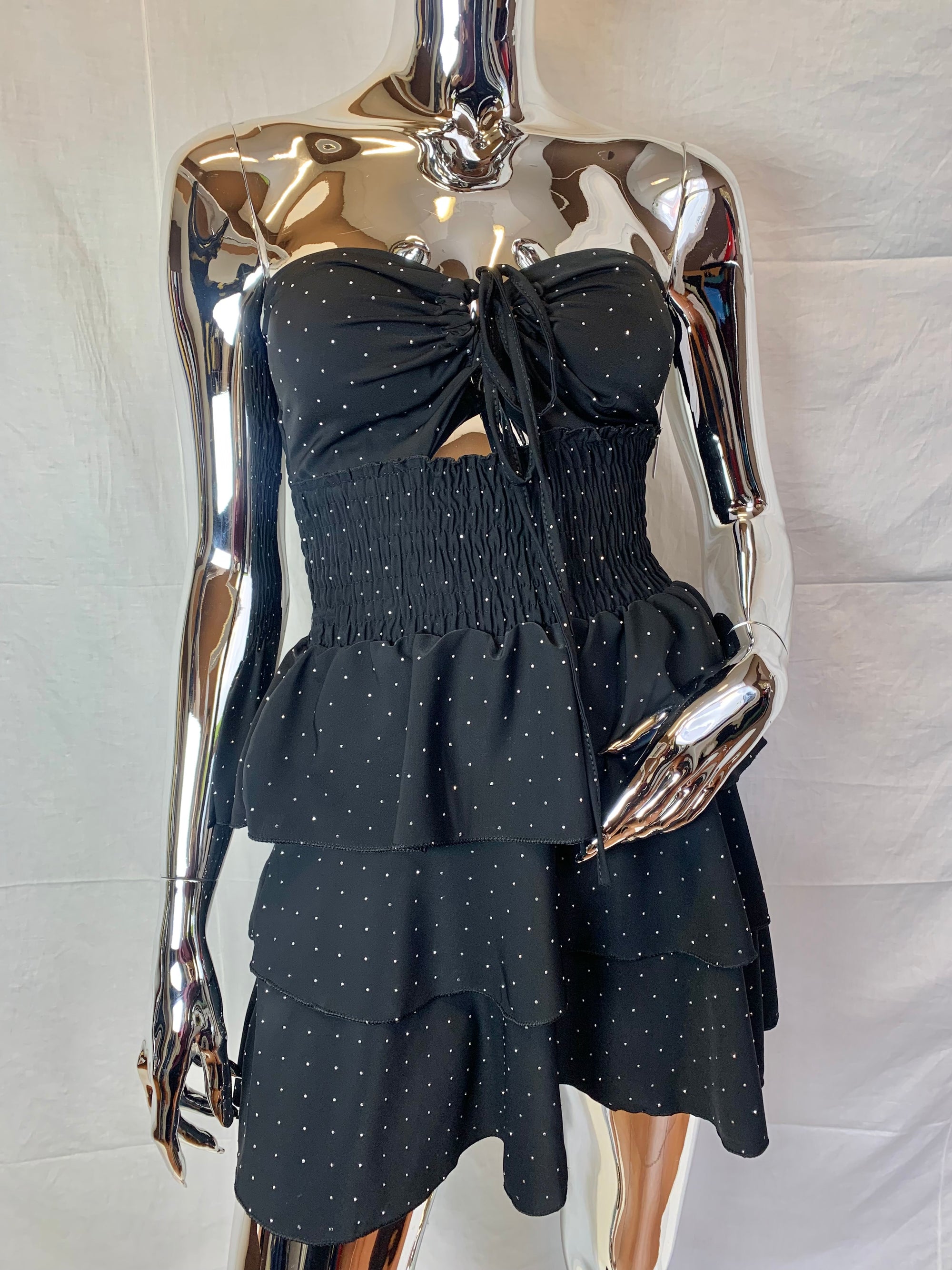 Vestito corto senza spalline, sotto svasato, con brillantini