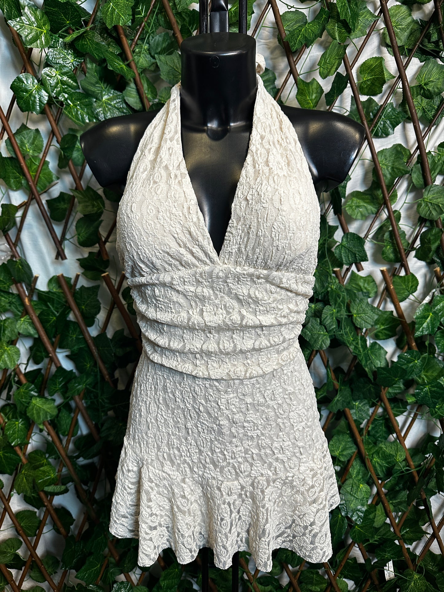 Crepe style: deep neckline with cups and open back, with shorts tucked in | one size