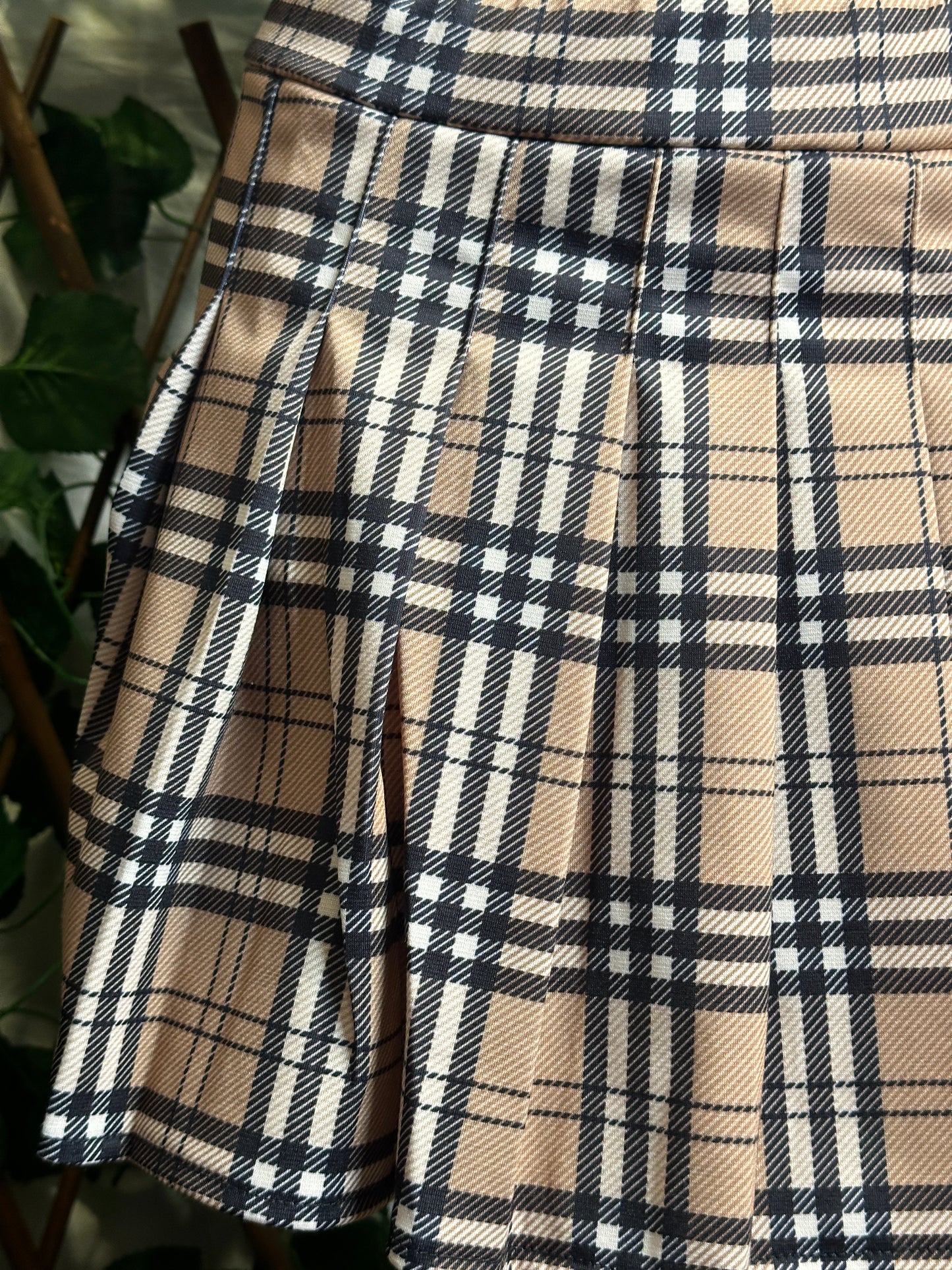 Short checked skirt with integrated shorts