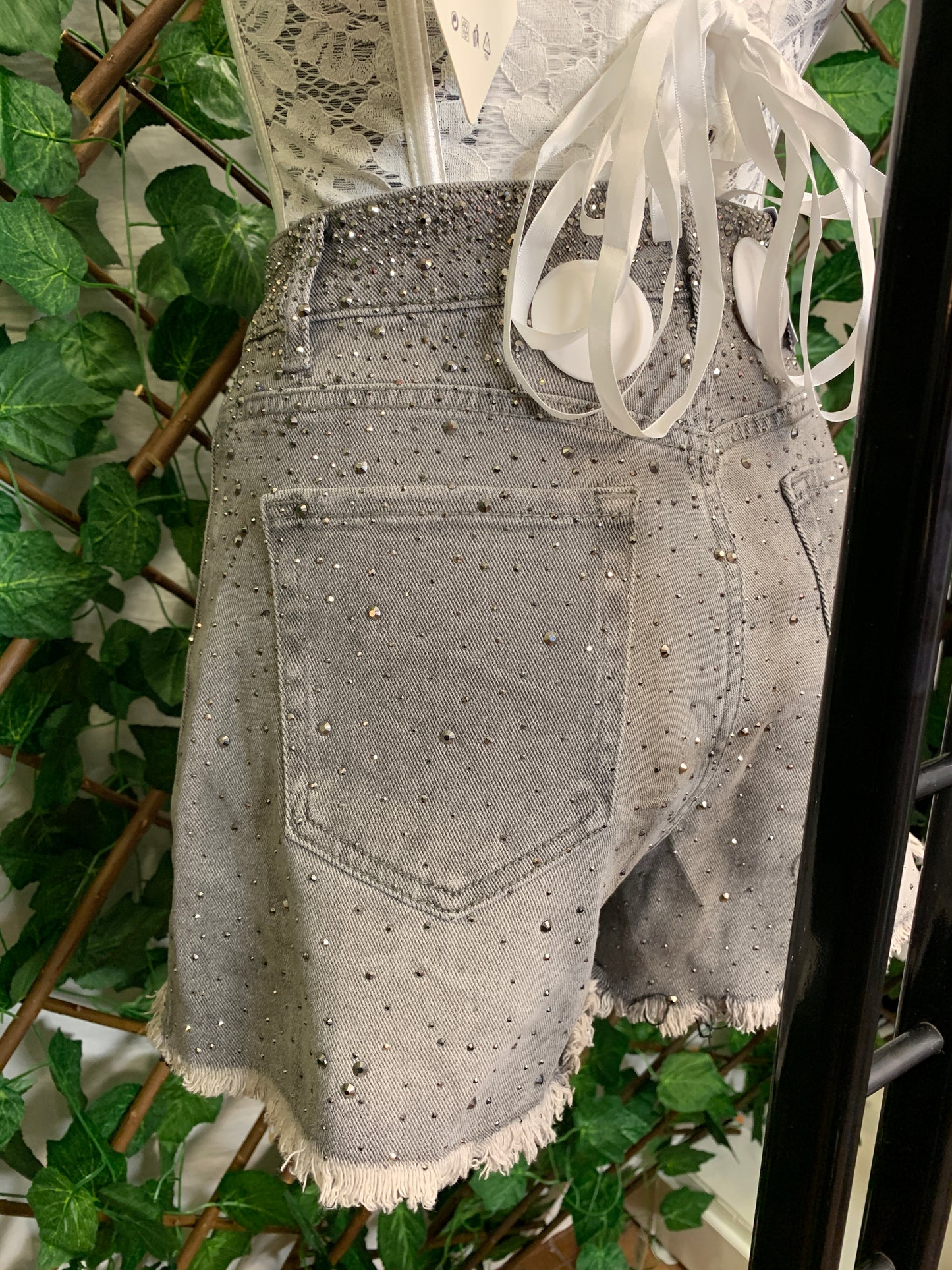 Gray denim shorts with glitter
