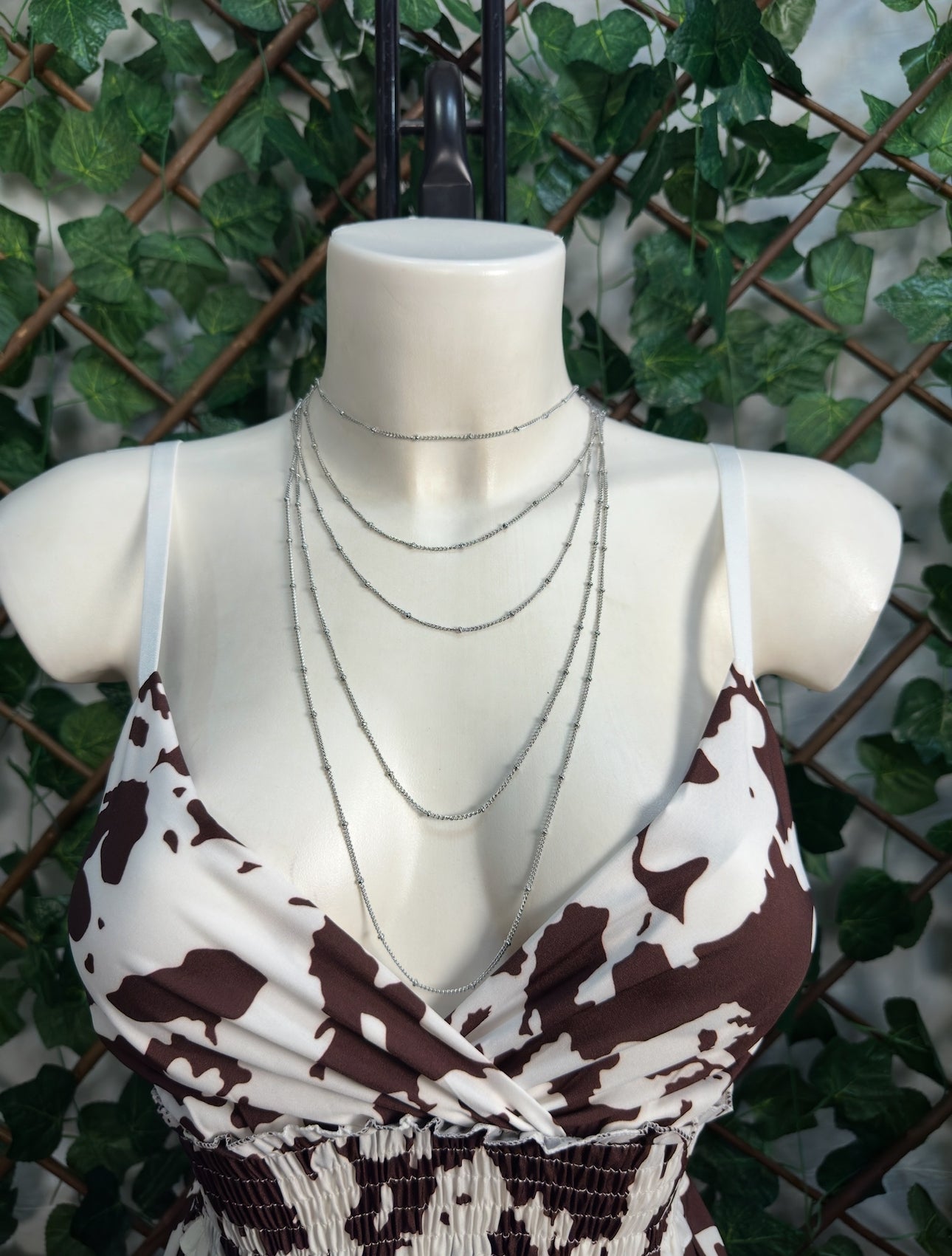 Gold and silver colored necklace