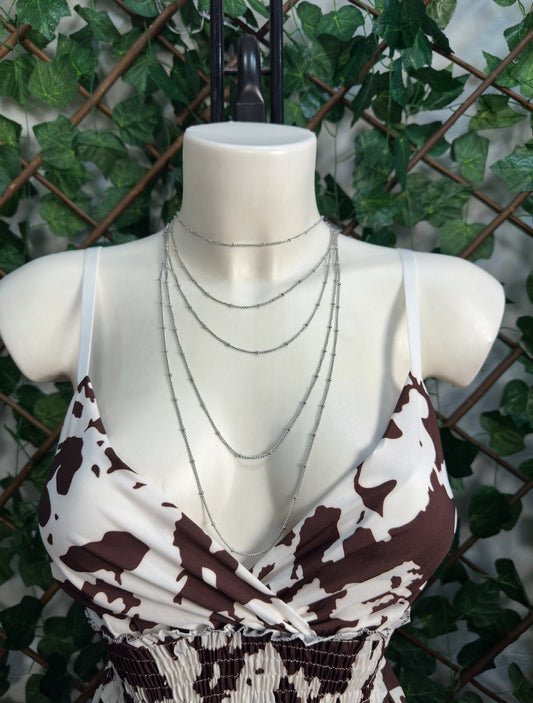 Gold and silver colored necklace