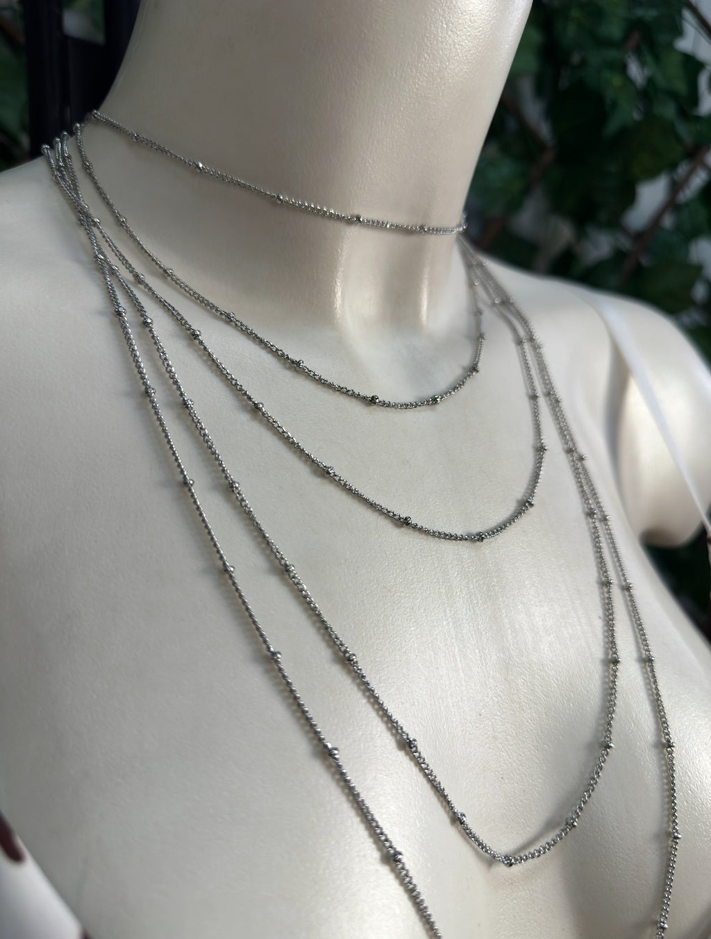 Collana di color oro e argento