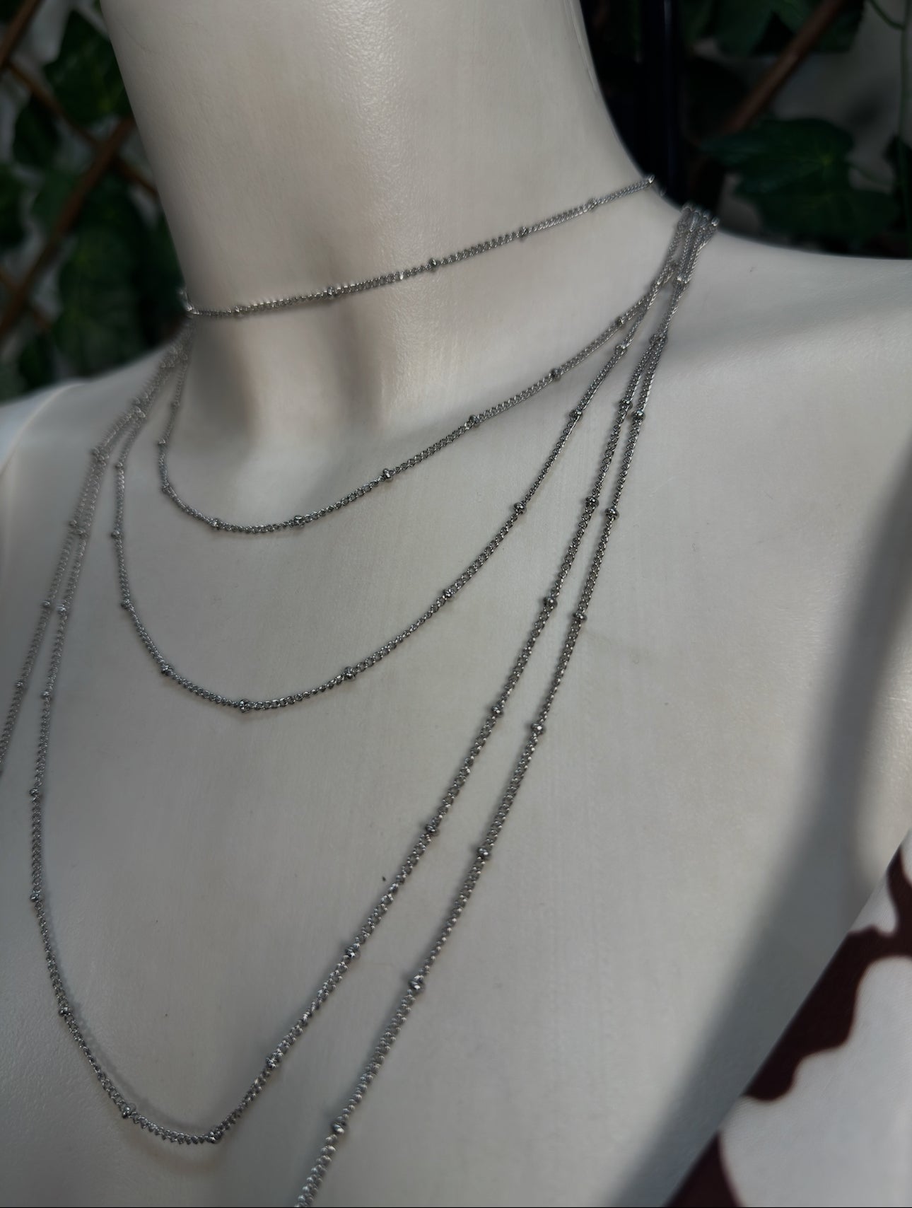 Gold and silver colored necklace