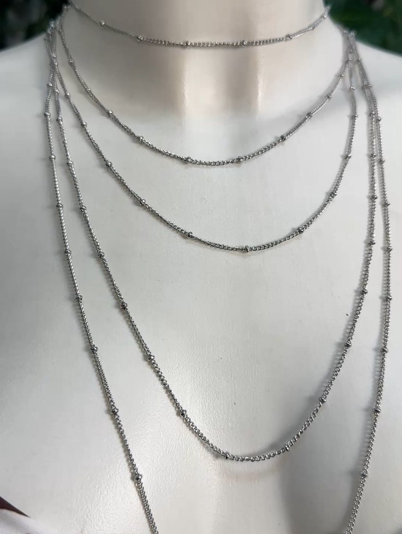 Gold and silver colored necklace