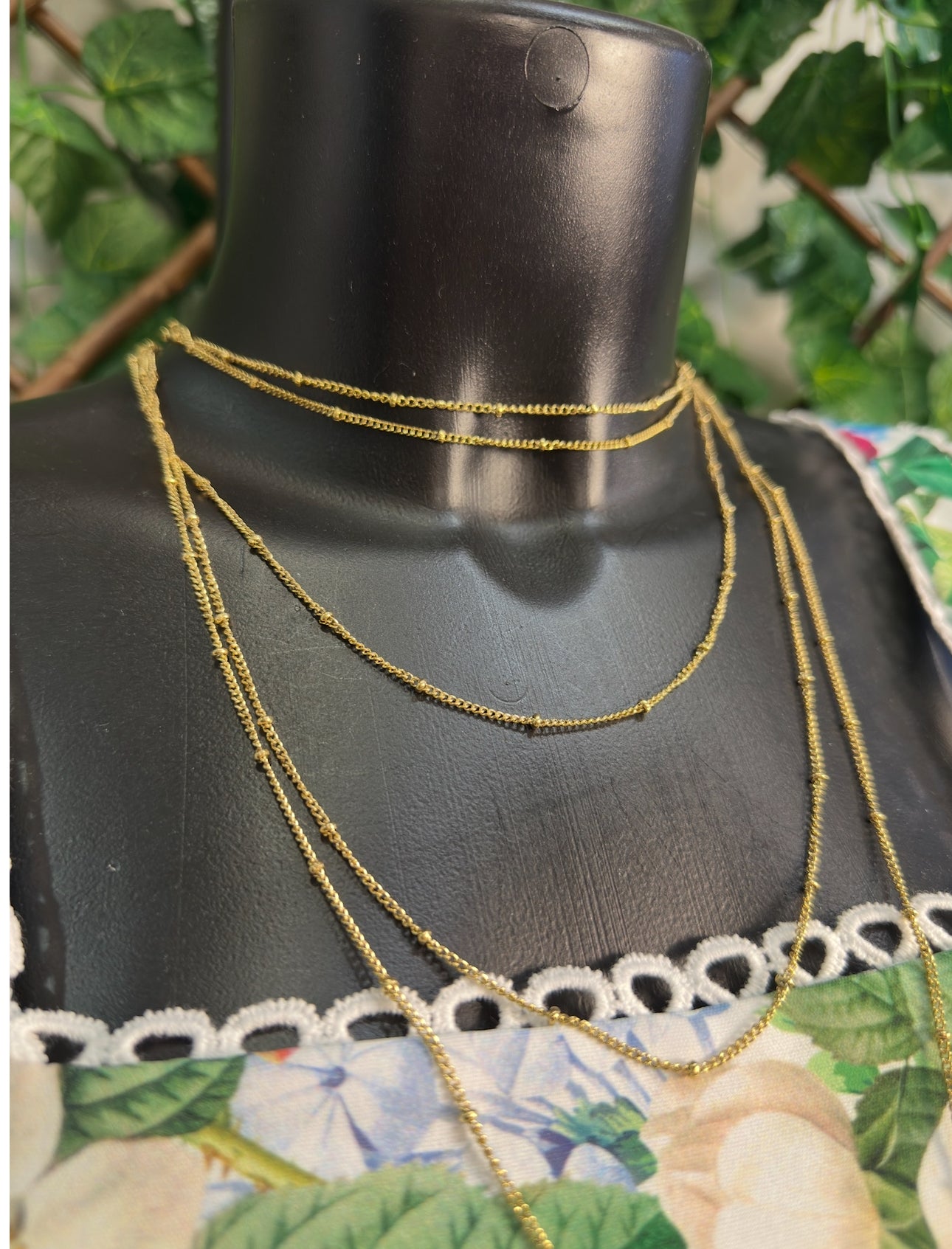 Gold and silver colored necklace